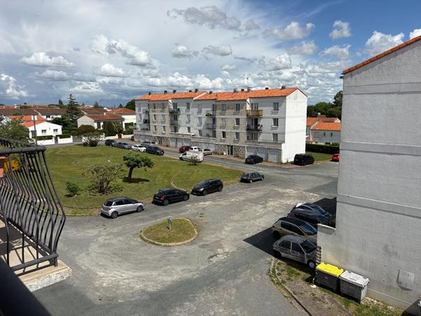 Appartement traversant de 70 m² + Box à vélos/motos + Balcon