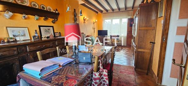 Maison semi-individuelle avec 3 chambres, bureau, garage, sous-sol et jardin.