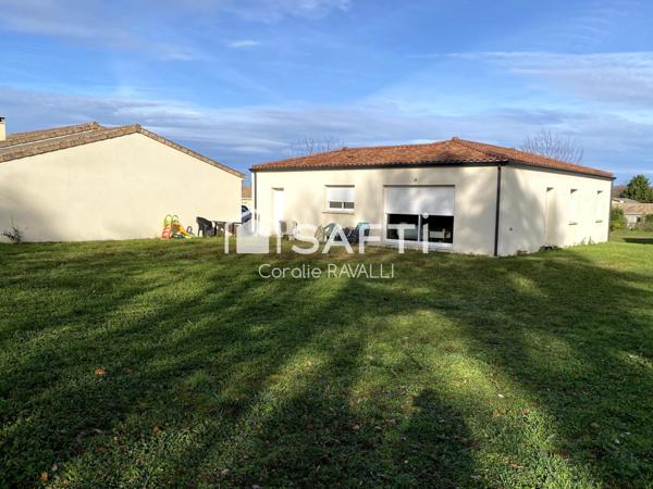 Maison récente en forme de L, luminosité, chauffage au sol et économies d’énergie