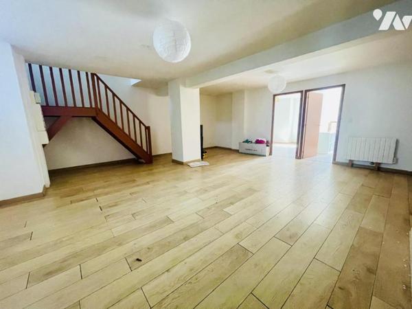 Immeuble à usage commercial et habitation