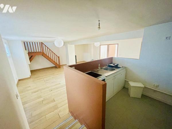 Immeuble à usage commercial et habitation