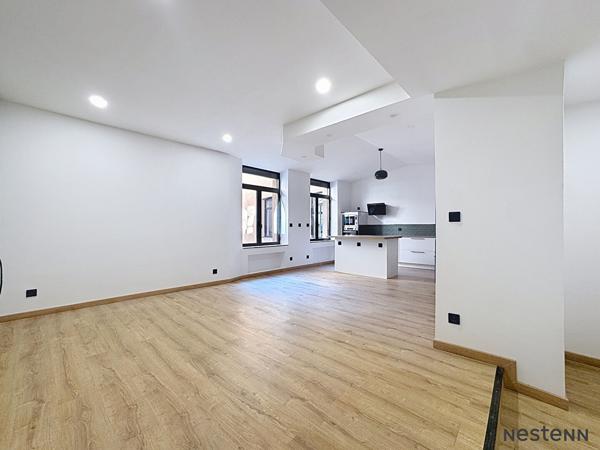 EXCLUSIVITÉ NESTENN LOCATION Non Meublé - Saint-Étienne Centre - Appartement T4 de 98,53 m² entièrement rénové - Charme de l'ancien - Calme absolu - Parking couvert - Climatisation