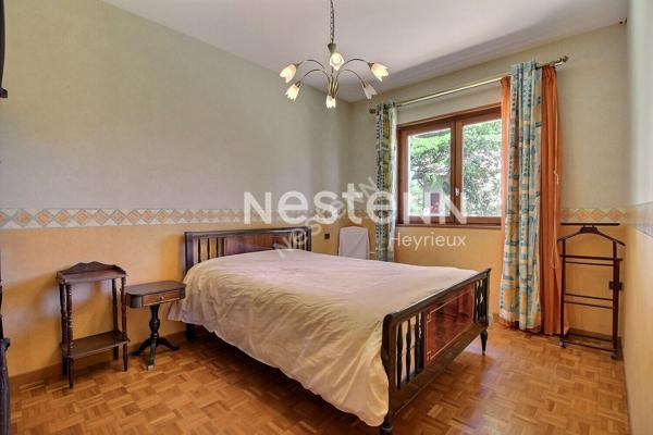 Maison individuelle de type 5 , sous sol complet sur 981 m² de terrain paysagé au calme