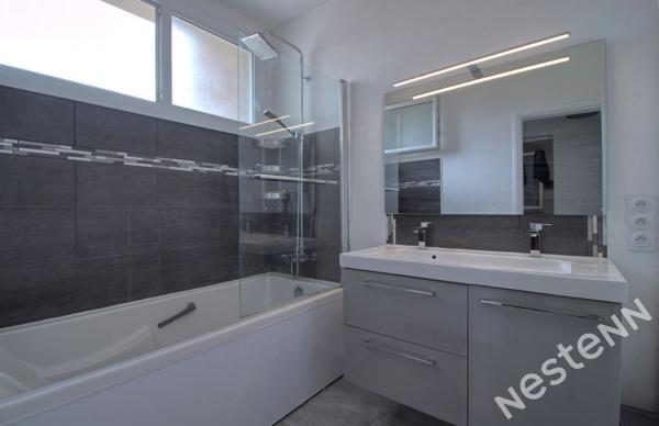 AGEN SUD - Appartement lumineux et fonctionnel de 81 m² avec balcon et garage dans une résidence sécurisée.