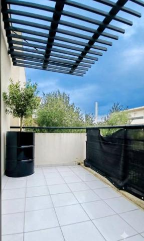 Deux pièces terrasse stationnement résidence sécurisée