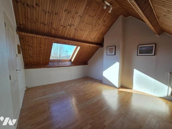 Canon d'Or : Maison bel étage des années 1930 disposant d’un garage et d’un jardin de ville.