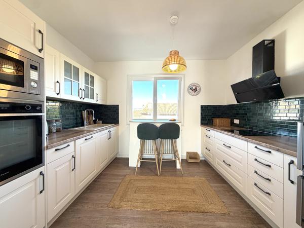 Appartement lumineux avec balcon sur le canal du Midi et deux places de stationnement