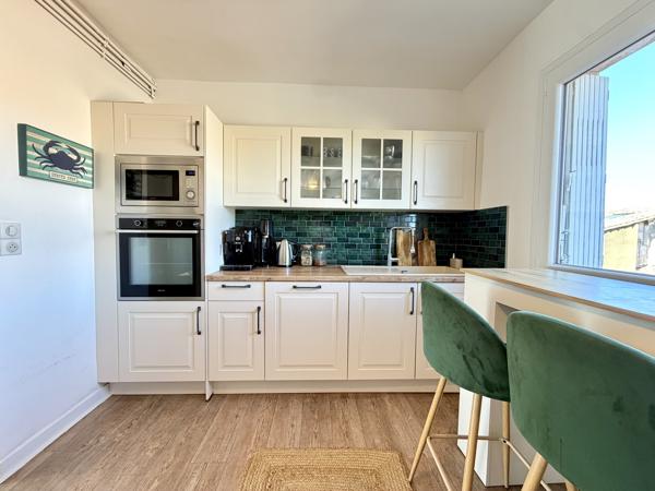 Appartement lumineux avec balcon sur le canal du Midi et deux places de stationnement