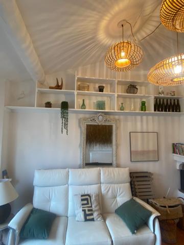 RARE......UNE MAISON: 2 APPARTEMENTS.