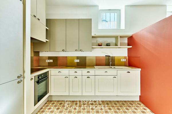 Ancienne boutique réhabilitée en appartement au coeur de Montmartre