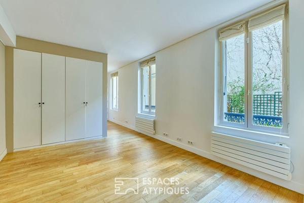 Ancienne boutique réhabilitée en appartement au coeur de Montmartre