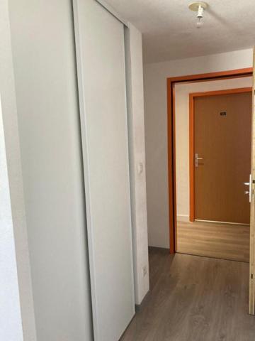 b - 1 appartement de type T3 duplex au dernier étage dans un immeuble à CORTE