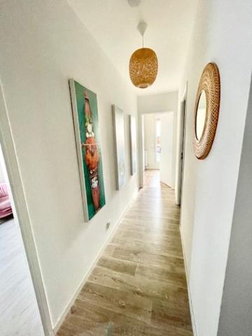 Duplex moderne avec terrasse et parkings