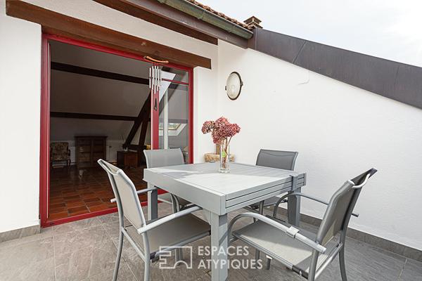 Maison de village aux volumes insoupçonnés et esprit loft sous les toits