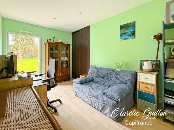 Maison d’architecte de plain-pied de 254 m² avec piscine intérieure et terrain de 3000 m² en plein cœur de Ploërmel