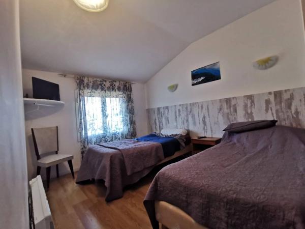 Bâtiment mixte restaurant + habitation