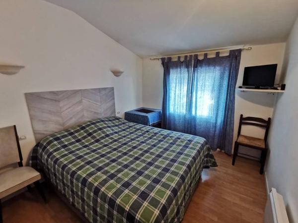 Bâtiment mixte restaurant + habitation