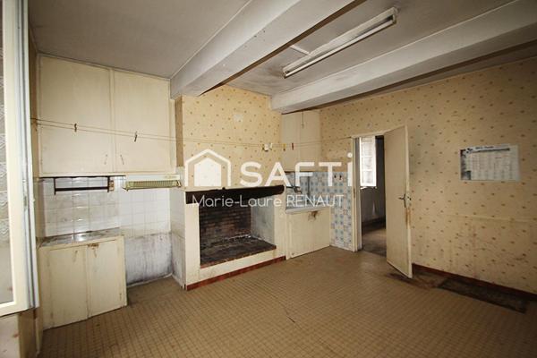 Maison de ville à rénover - 2 chambres - Petite terrasse et cave en sous-sol