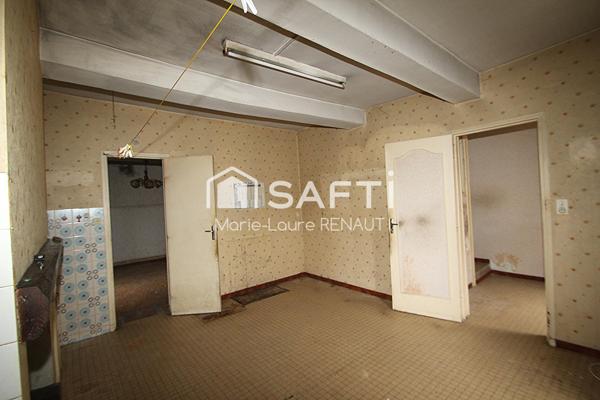 Maison de ville à rénover - 2 chambres - Petite terrasse et cave en sous-sol