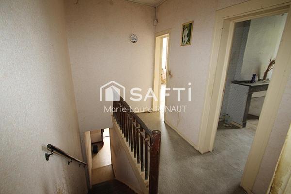 Maison de ville à rénover - 2 chambres - Petite terrasse et cave en sous-sol