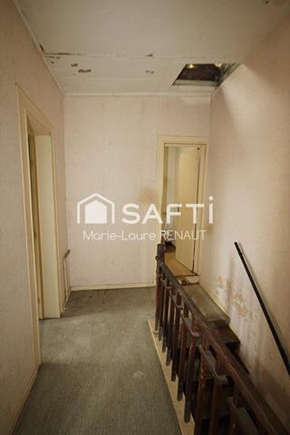 Maison de ville à rénover - 2 chambres - Petite terrasse et cave en sous-sol