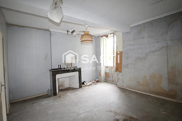 Maison de ville à rénover - 2 chambres - Petite terrasse et cave en sous-sol