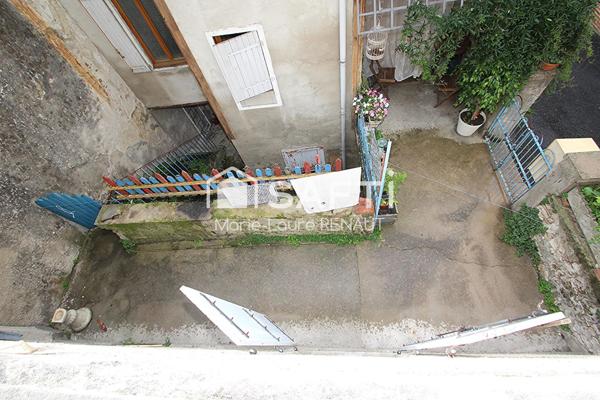 Maison de ville à rénover - 2 chambres - Petite terrasse et cave en sous-sol
