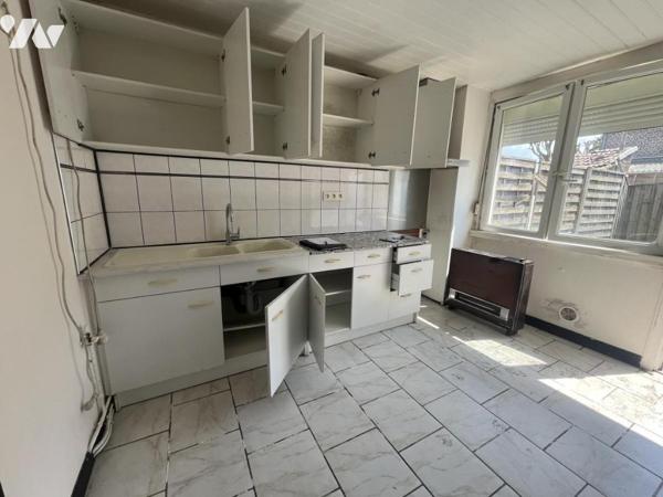 MAISON TYPE 1930 AVEC ACCES A L'ARRIERE