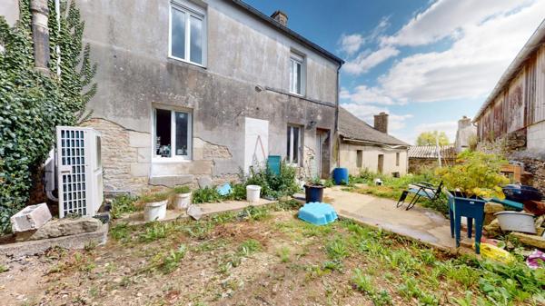 Ensemble immobilier composé d'une maison d'habitation de 148 m² et dépendance de 113 m².