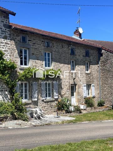 Maison mitoyenne en pierre, terrain et dépendance