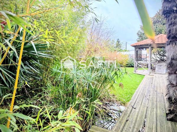 Maison 4 chambres + bureau avec doubles garages – À 300 m du Théâtre Piano’cktail