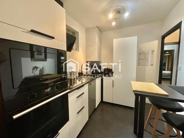 Appartement de 63m2 dans le pentagone , 2 chambres, 2 balcons, 1 cave , 1 place de parking