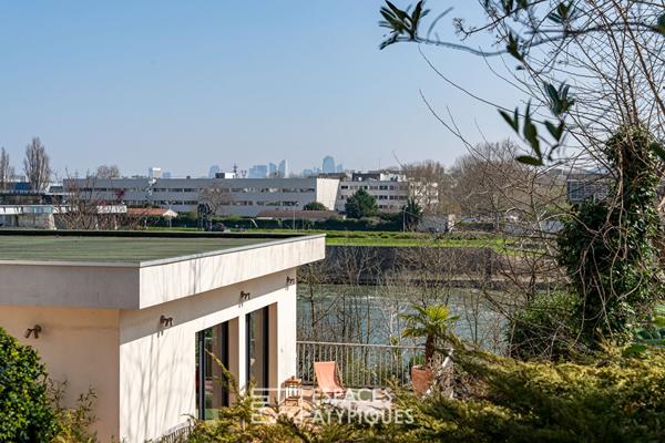Maison d’architecte des années 70 avec une vue magnifique sur les bords de Seine