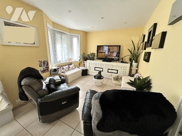 VENTE EN VIAGER OCCUPE - APPARTEMENT CENTRE DE COUTAINVILLE