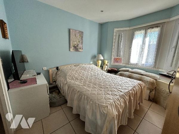 VENTE EN VIAGER OCCUPE - APPARTEMENT CENTRE DE COUTAINVILLE