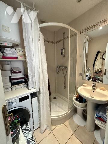 VENTE EN VIAGER OCCUPE - APPARTEMENT CENTRE DE COUTAINVILLE