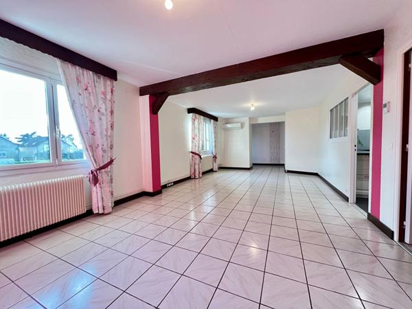 Maison de plain-pied avec jardin, véranda et garage - quartier de la Petite Espère