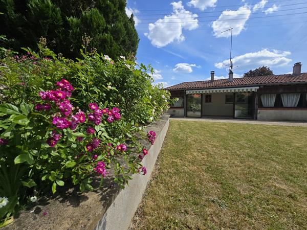 Maison de plain-pied avec jardin, véranda et garage - quartier de la Petite Espère