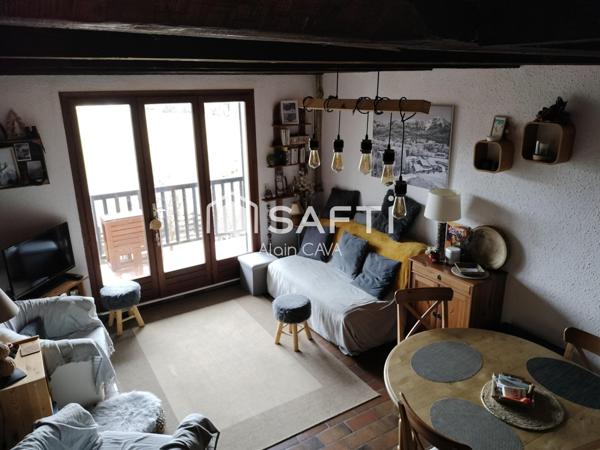 Très bel Appartement de 76m² de type 3/4 sur 1 niveau avec mezzanie, terrasse , casier à ski, parking commun vue dégagé