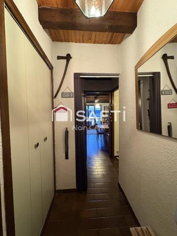 Très bel Appartement de 76m² de type 3/4 sur 1 niveau avec mezzanie, terrasse , casier à ski, parking commun vue dégagé