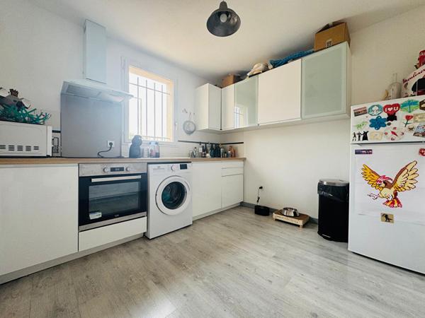 Appartement type 2 avec terrasse garage et stationnement