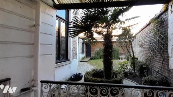immeuble bourgeois avec jardin