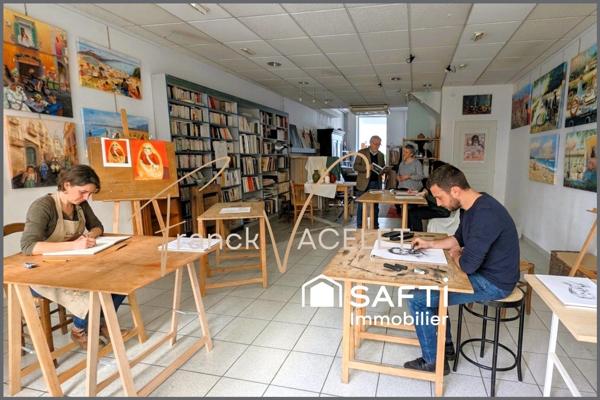 Grande demeure de caractère avec local commercial dans le centre historique