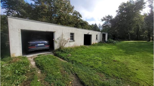 Propriété de 337 m² (hab + gîte + dép) sur 10800m² de terrain.