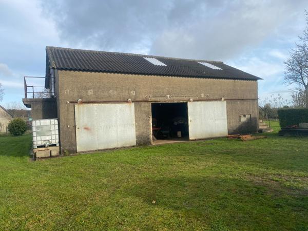 Garage sur terrain constructible, 1400 m² !