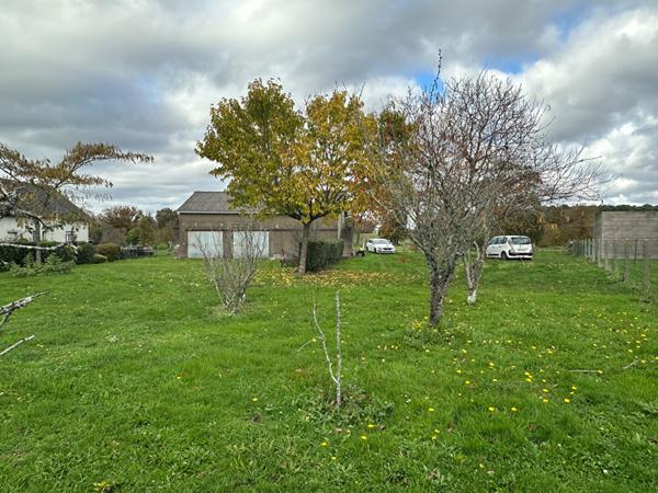 Garage sur terrain constructible, 1400 m² !