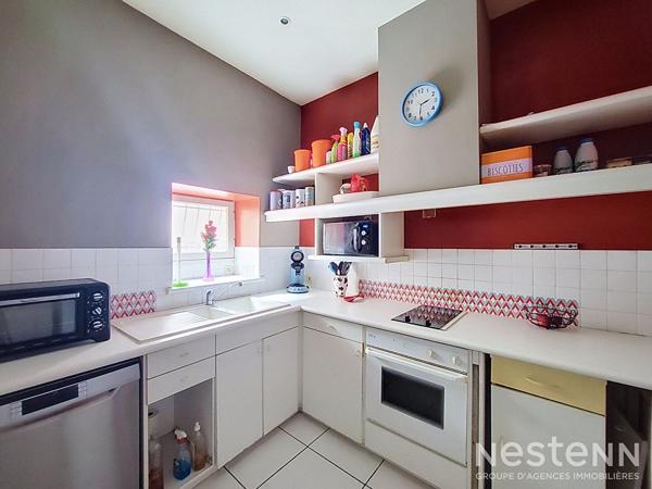 À Vendre Immeuble de rapport avec local commercial de 70 m² et appartement de 84 m² loués au coeur historique de Condom