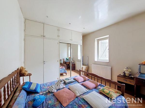 À Vendre Immeuble de rapport avec local commercial de 70 m² et appartement de 84 m² loués au coeur historique de Condom