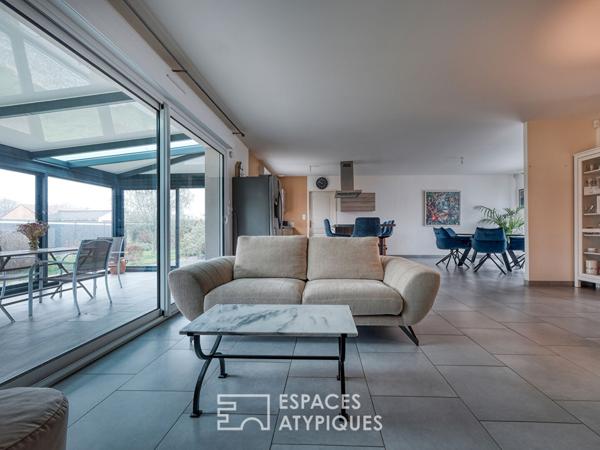 Maison contemporaine et jardin paysager