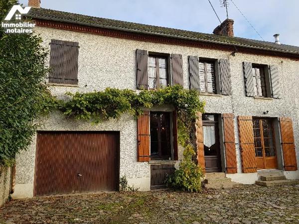 Maison de bourg avec garage et jardin
